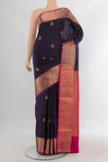 Pure Silk Navy Blue Soft Saree with Zari Butta on the body and Zari Border.  displayed on a mannequin