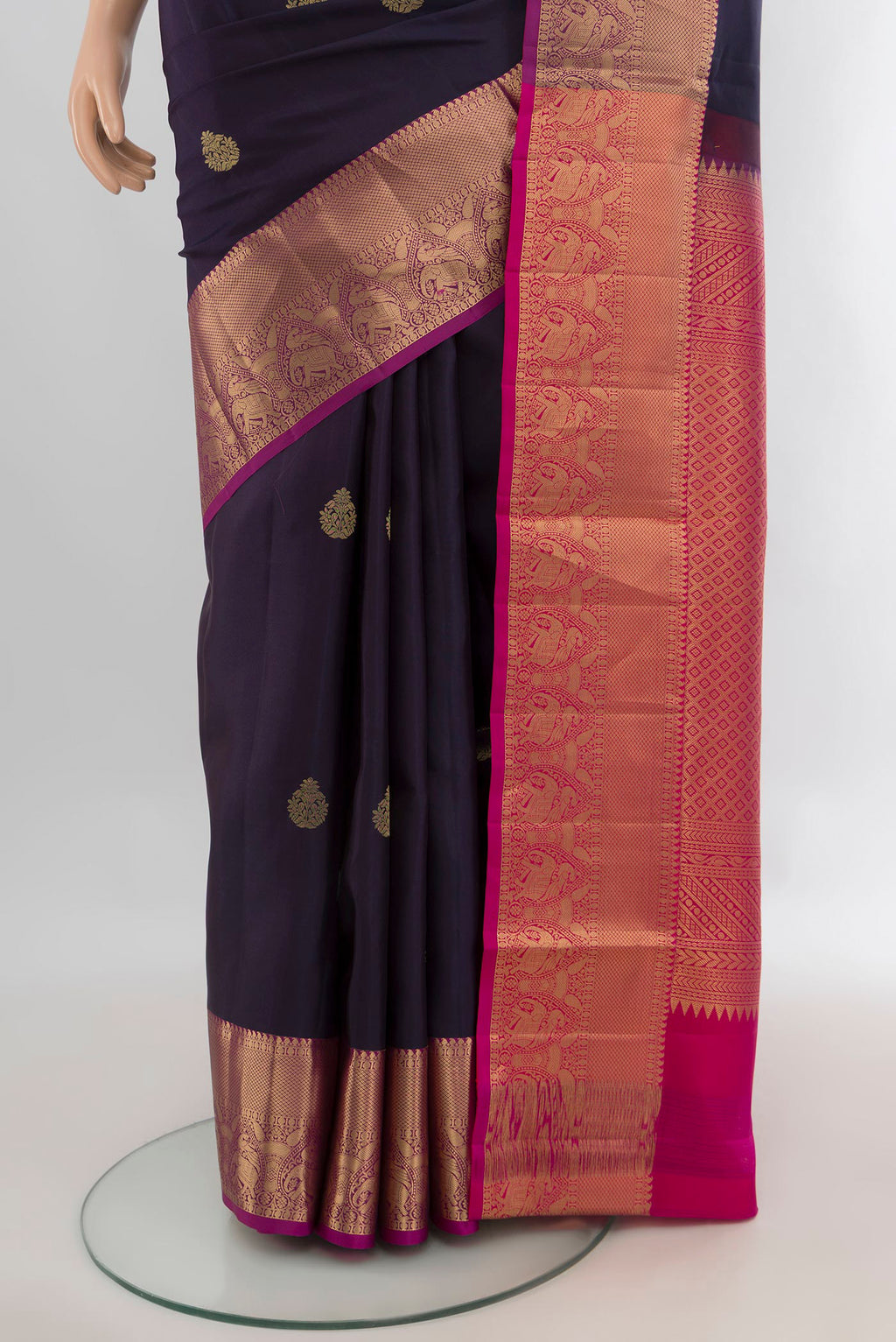 Pleats and pallu of Pure Silk Navy Blue Soft Saree with Zari Butta on the body and Zari Border. 