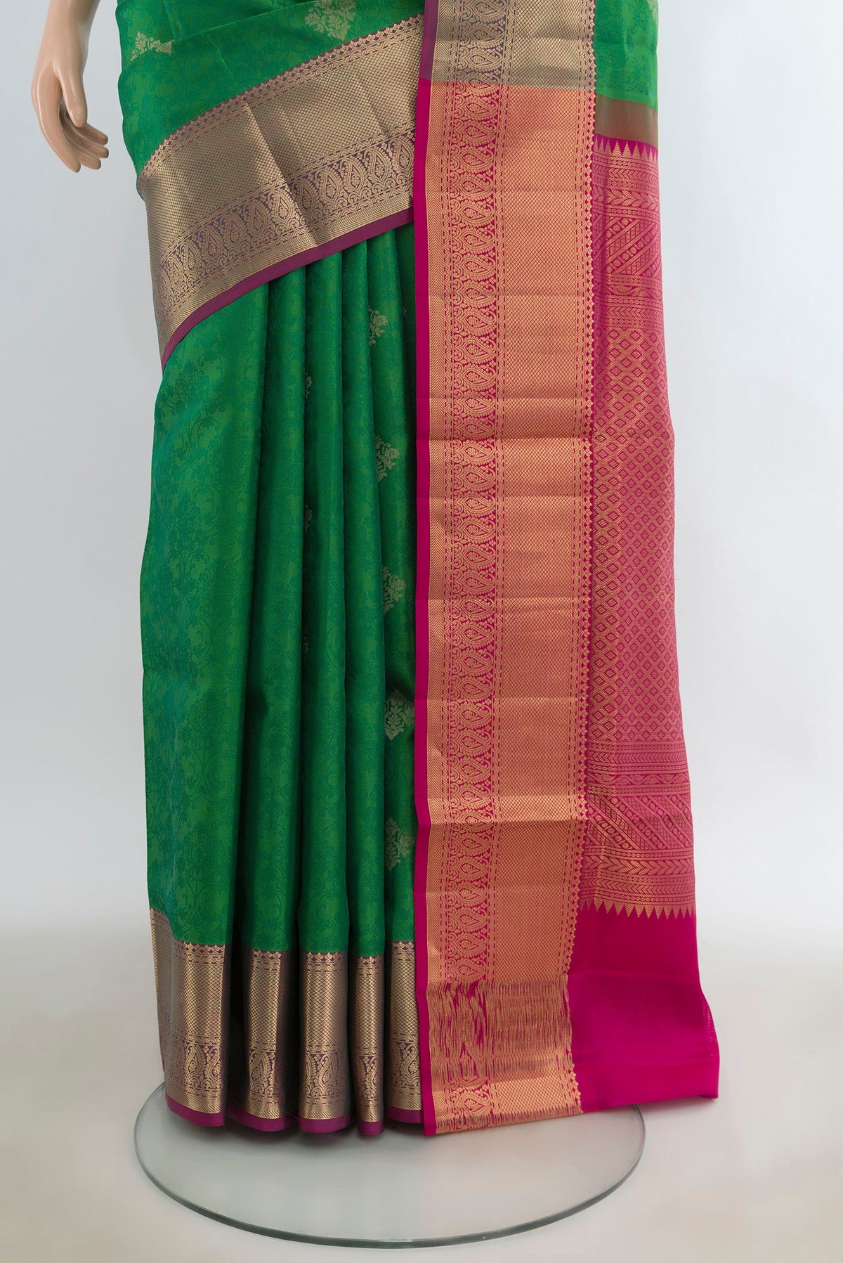 Pleats and pallu of Pure Silk Green Soft Saree with Jacquard With Zari Butta on the body and Zari Border. 