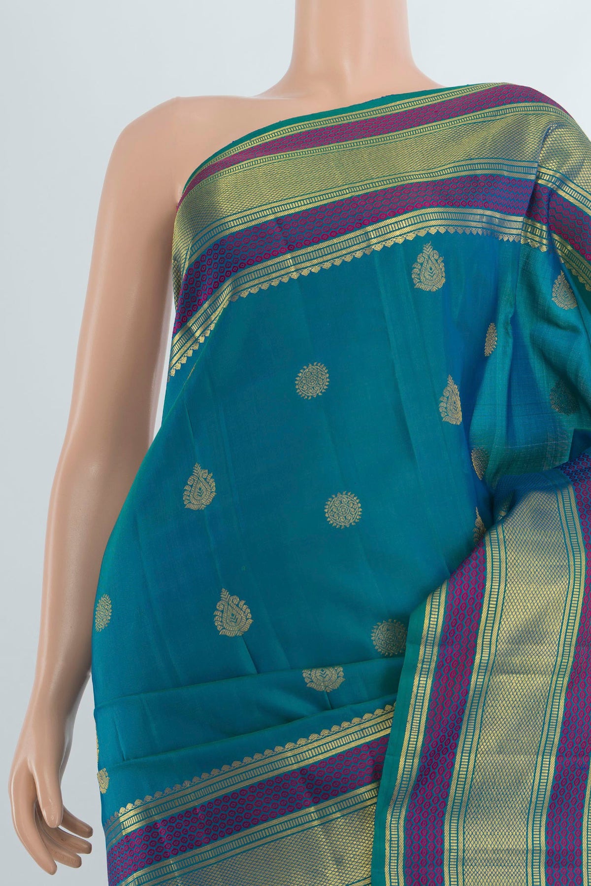 Border image of Pure Silk Pure Zari Peacock Blue Kanjivaram Saree with Zari Butta on the body and Silk Border. 