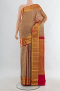 Pure Silk Sandal Kanchipuram Saree with Zari Butta on the body and Zari Border.  displayed on a mannequin