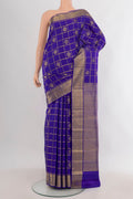 Pure Silk Royal Blue Kanjivaram Saree with Checked design on the body and Zari Border.  displayed on a mannequin