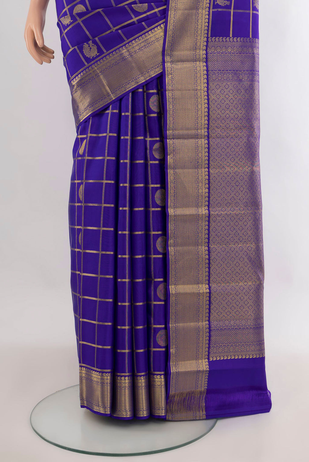 Pleats and pallu of Pure Silk Royal Blue Kanjivaram Saree with Checked design on the body and Zari Border. 