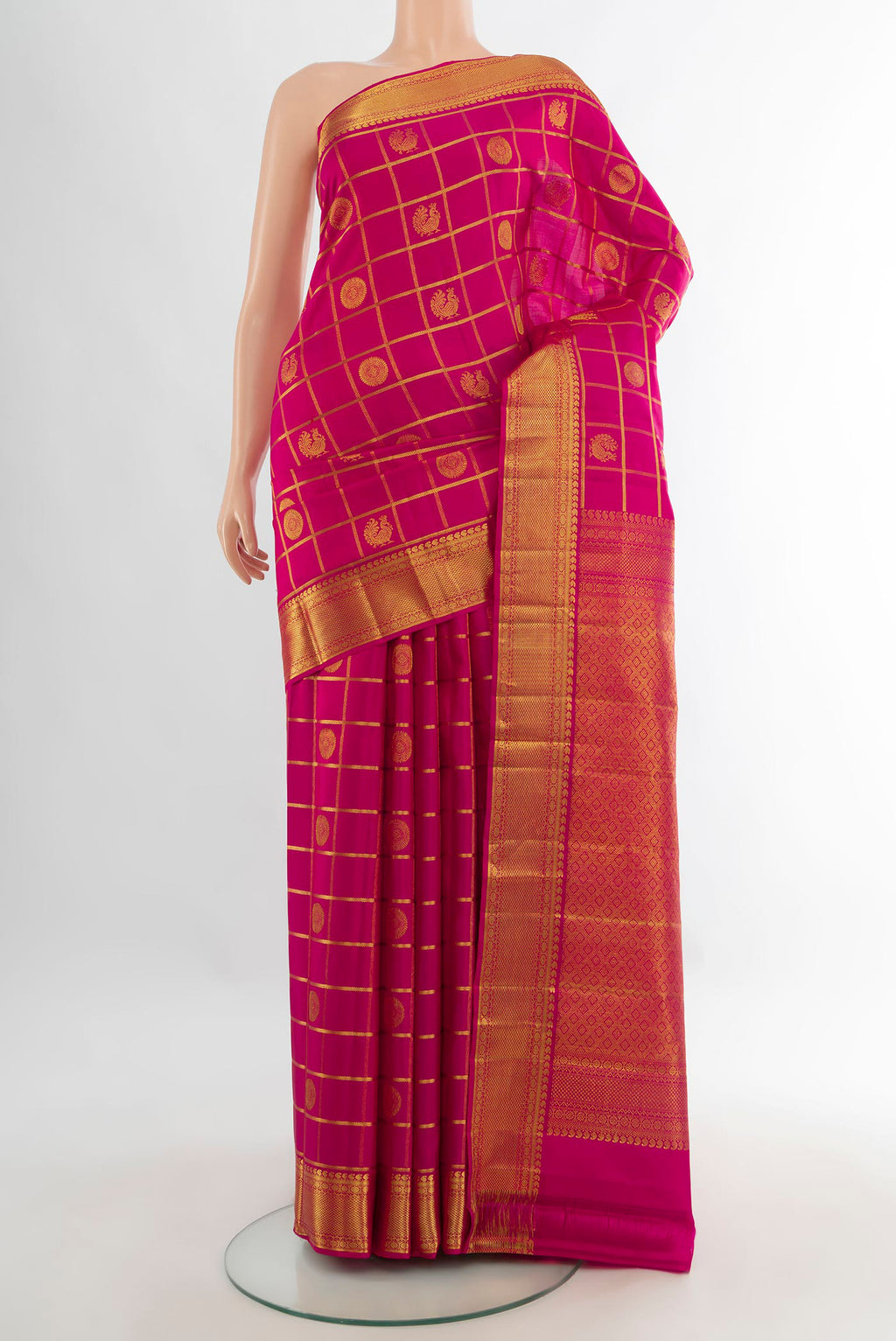 Pure Silk Pink Kanjivaram Saree with Checked design on the body and Zari Border.  displayed on a mannequin
