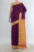Pure Silk Purple Kanjivaram Saree with Zari Butta on the body and Zari Border.  displayed on a mannequin