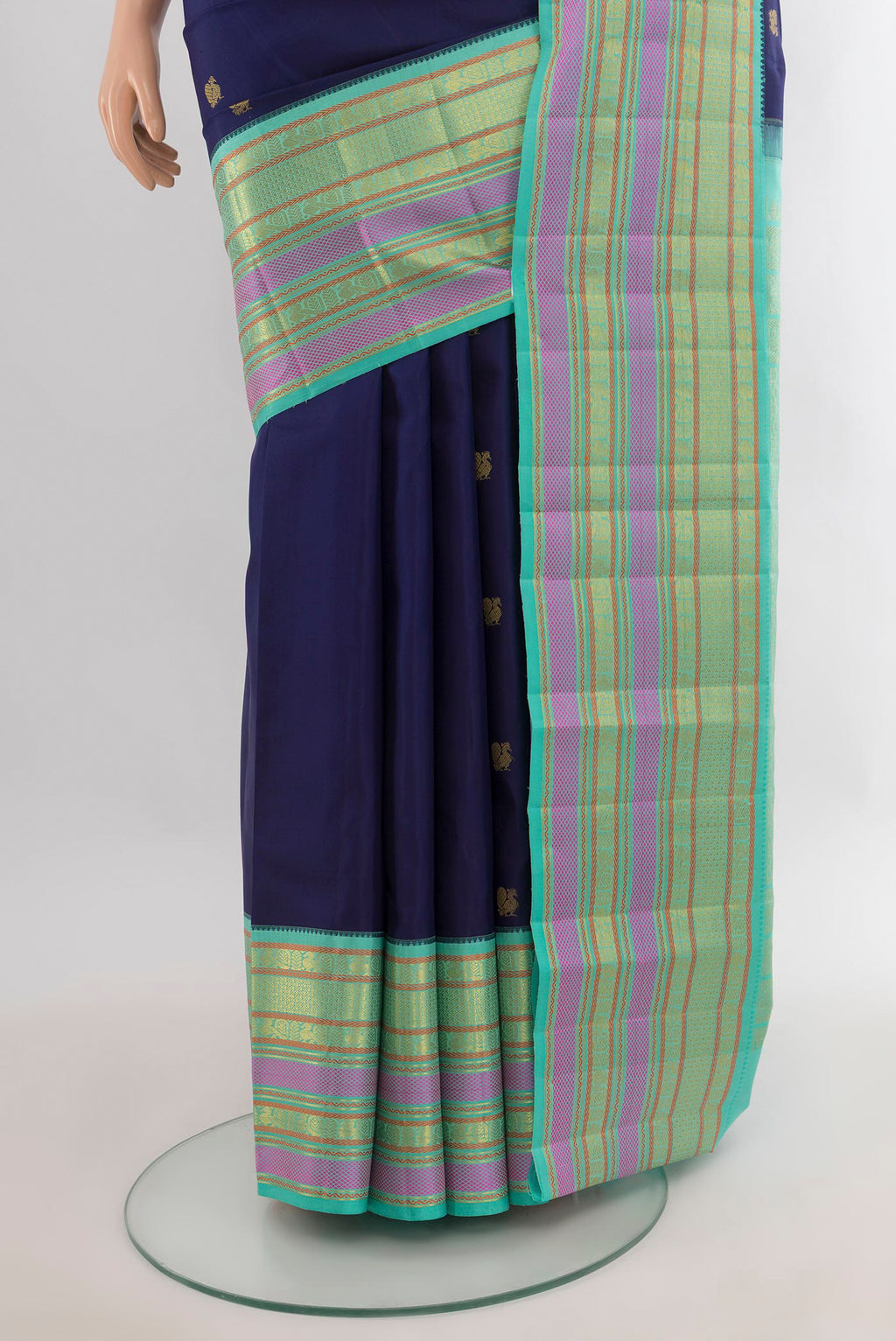 Pleats and pallu of Pure Silk Navy Blue Kanjivaram Saree with Zari Butta on the body and Zari Border. 