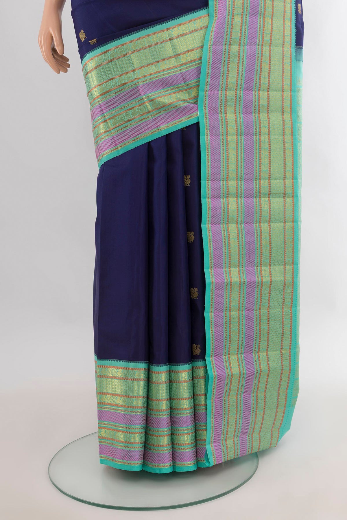 Pleats and pallu of Pure Silk Navy Blue Kanjivaram Saree with Zari Butta on the body and Zari Border. 