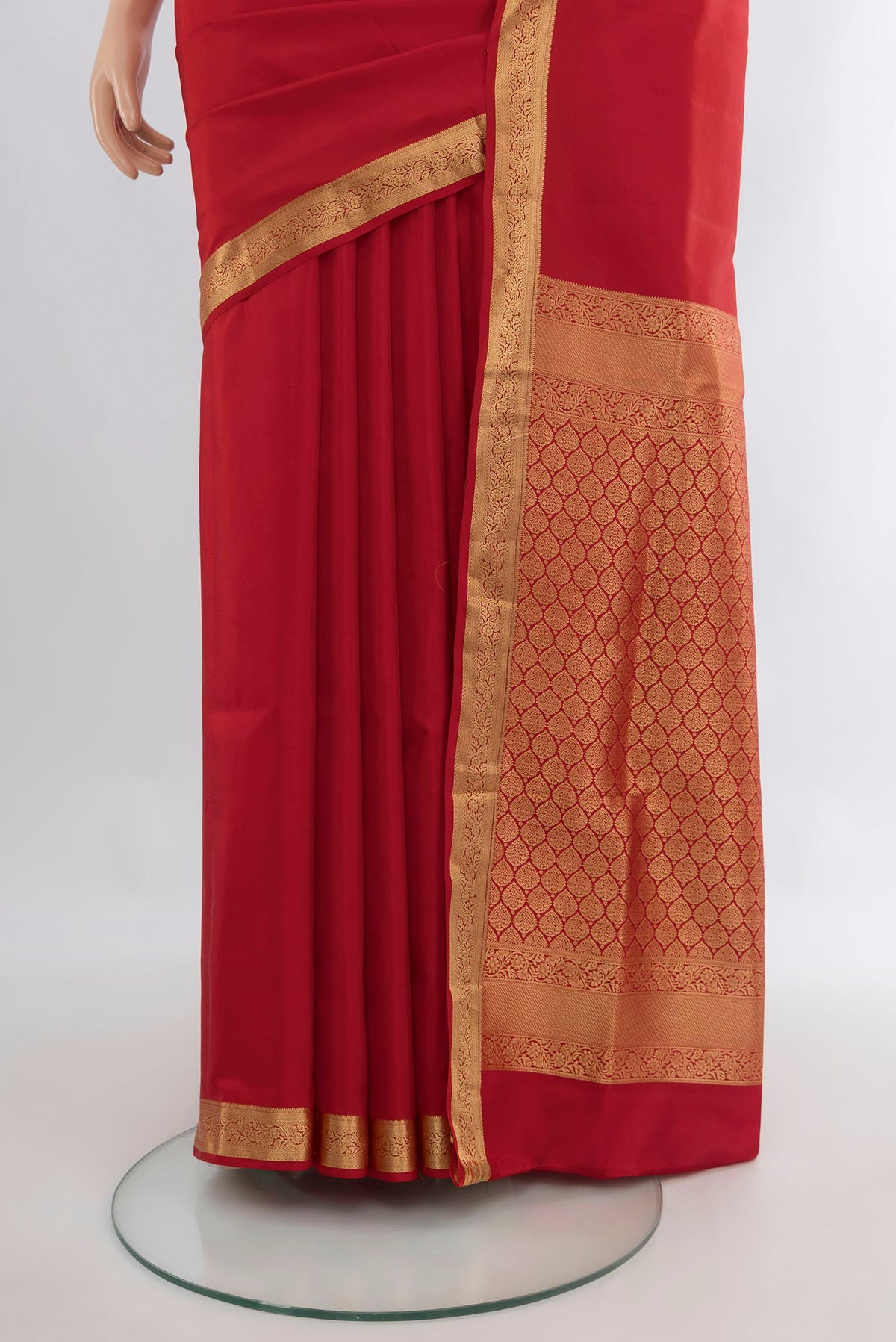 Pleats and pallu of Pure Silk Red Soft Saree with Zari Butta on the body and Zari Border. 
