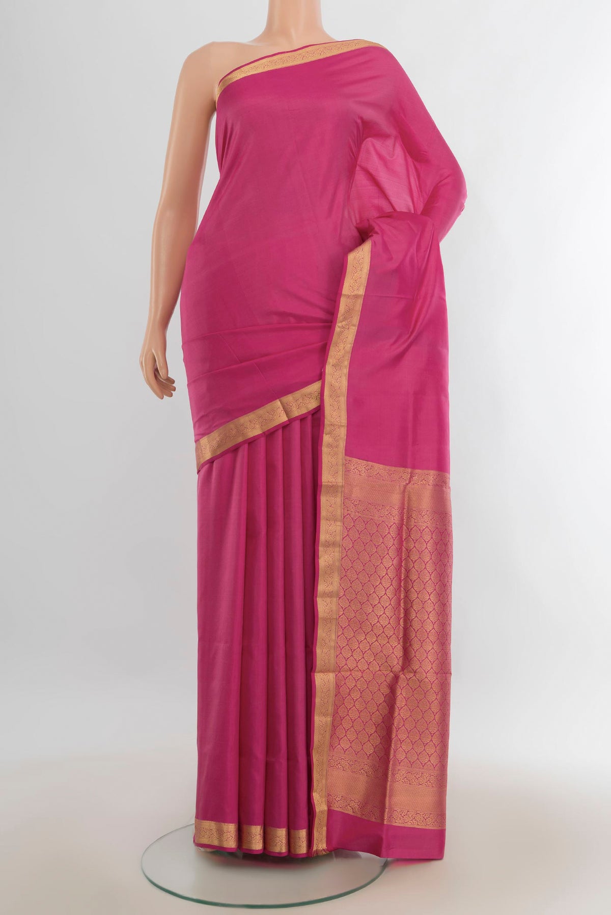 Pure Silk Rose pink Soft Saree with Zari Butta on the body and Silk Border.  displayed on a mannequin