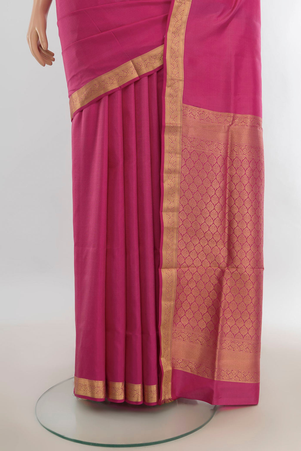Pleats and pallu of Pure Silk Rose pink Soft Saree with Zari Butta on the body and Silk Border. 