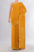 Pure Silk Yellow Soft Saree with Plain Body and Zari Border.  displayed on a mannequin