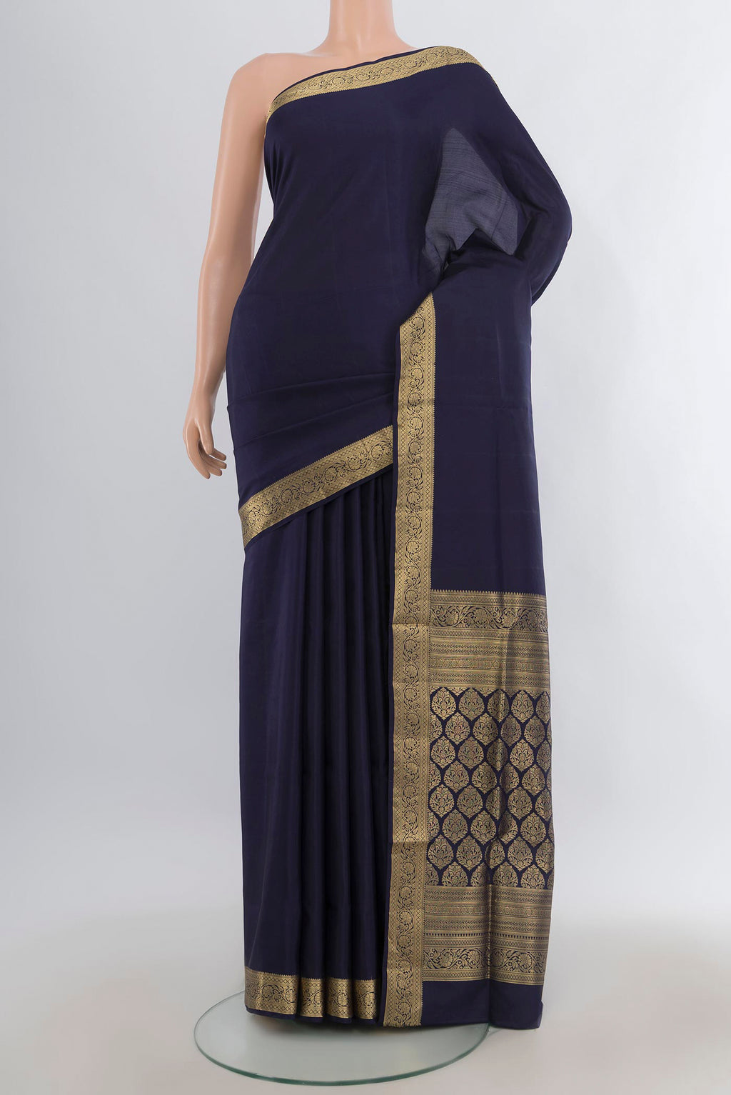 Pure Silk Navy Blue Soft Saree with Plain Body and Zari Border.  displayed on a mannequin