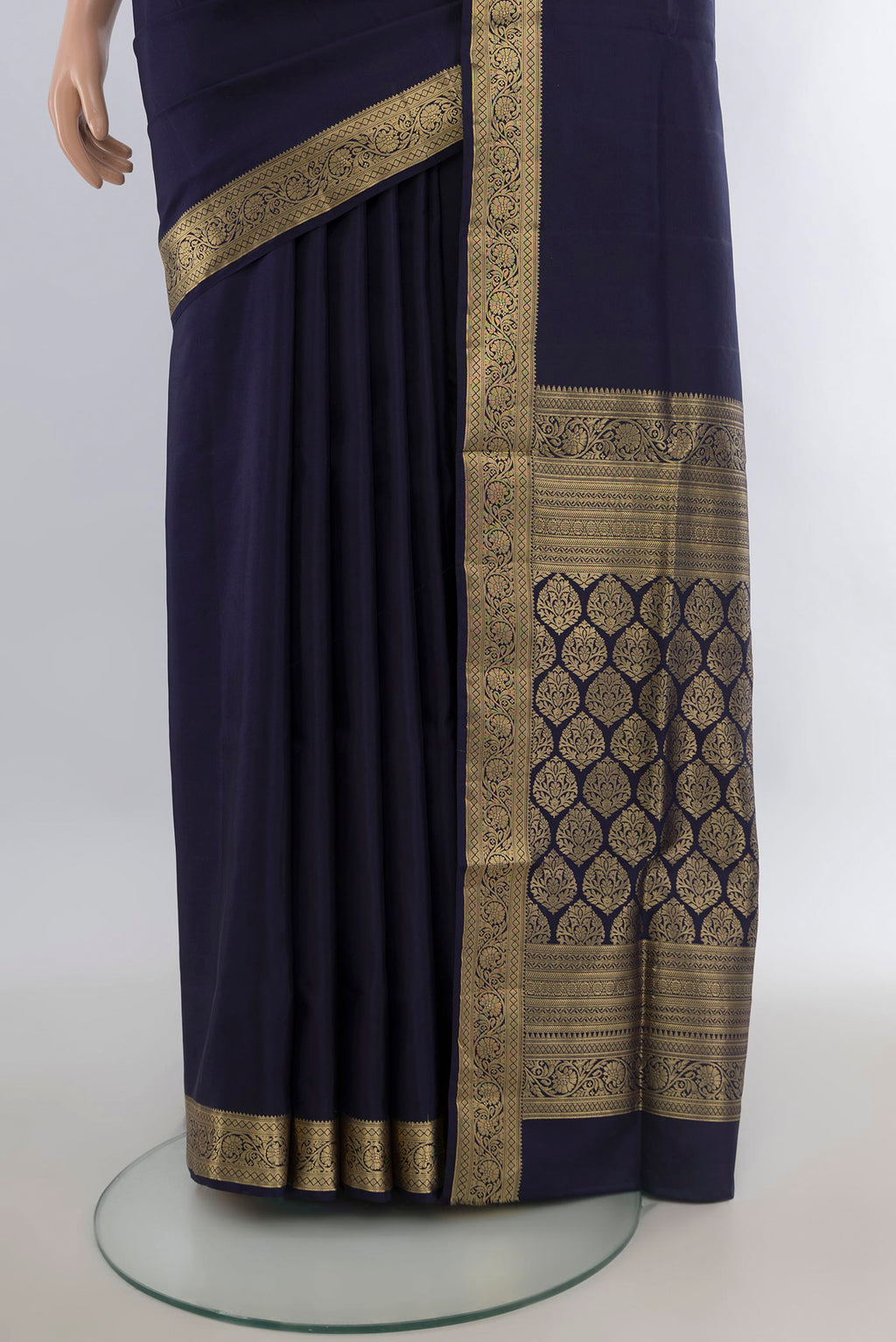 Pleats and pallu of Pure Silk Navy Blue Soft Saree with Plain Body and Zari Border. 