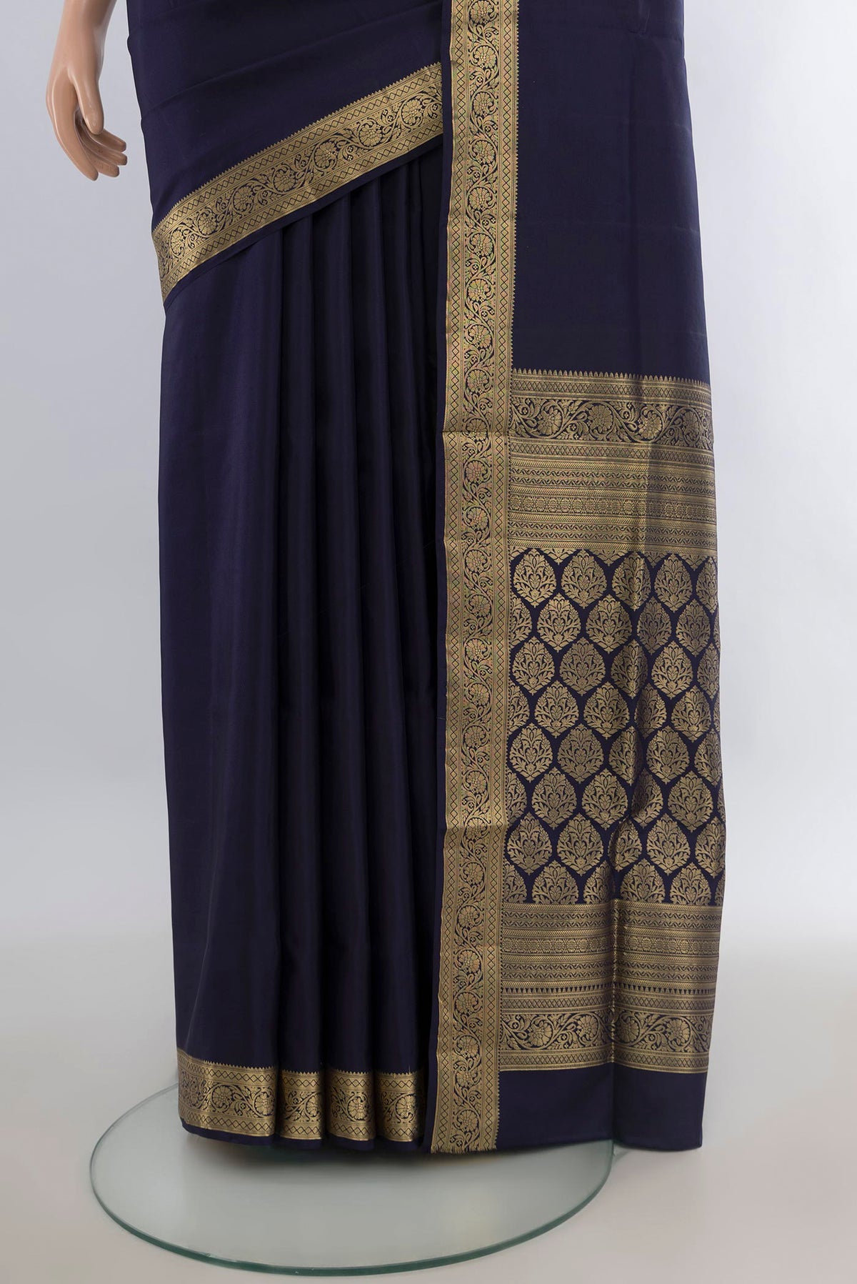 Pleats and pallu of Pure Silk Navy Blue Soft Saree with Plain Body and Zari Border. 