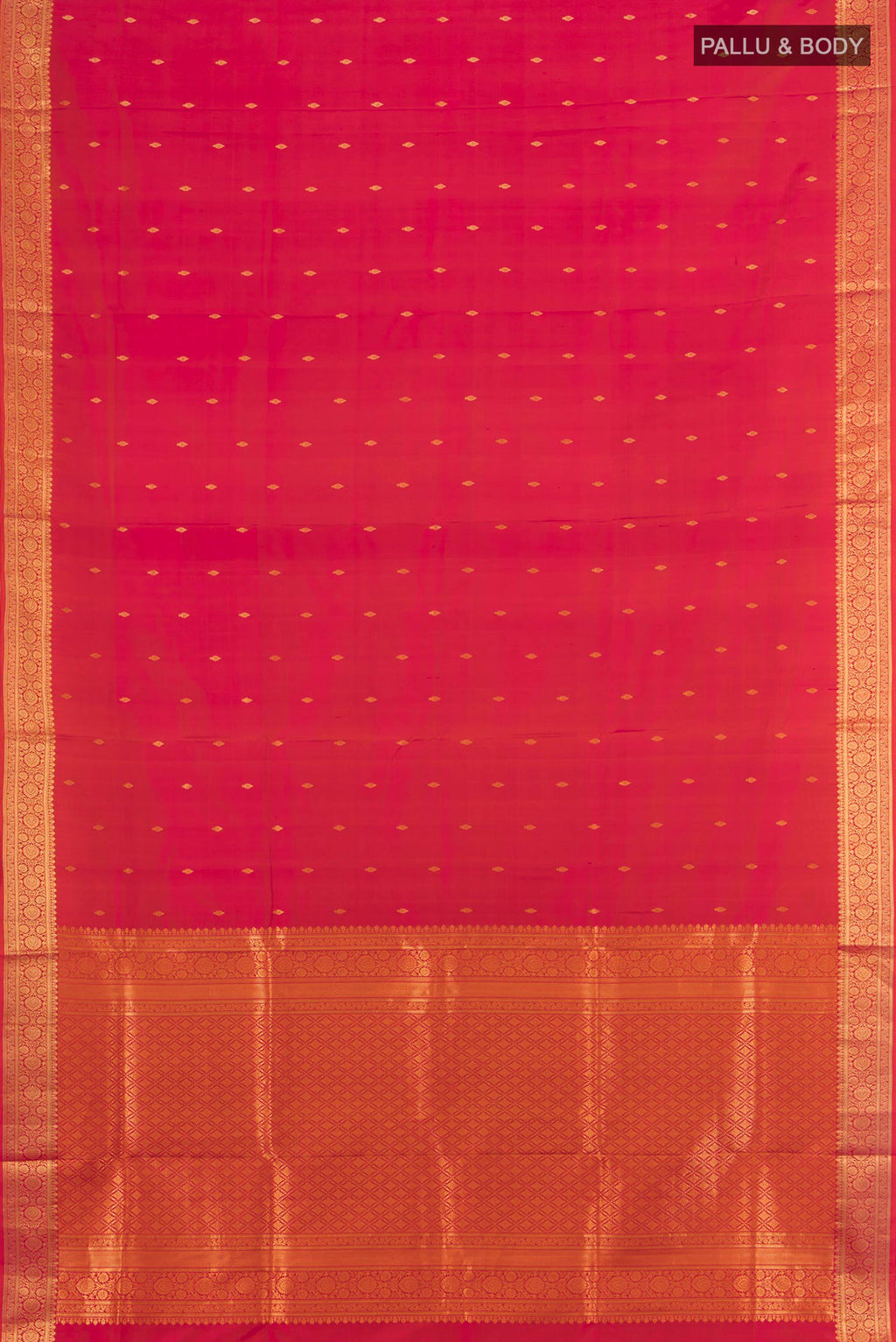 Flat view of Pure Silk Brick Orange Dual Tone Soft Saree with Zari Butta on the body and Zari Border. 