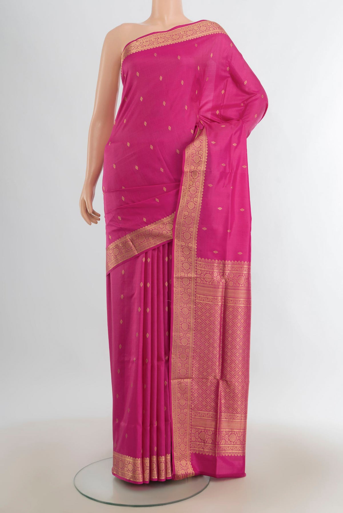 Pure Silk Rose pink Soft Saree with Zari Butta on the body and Silk Border.  displayed on a mannequin