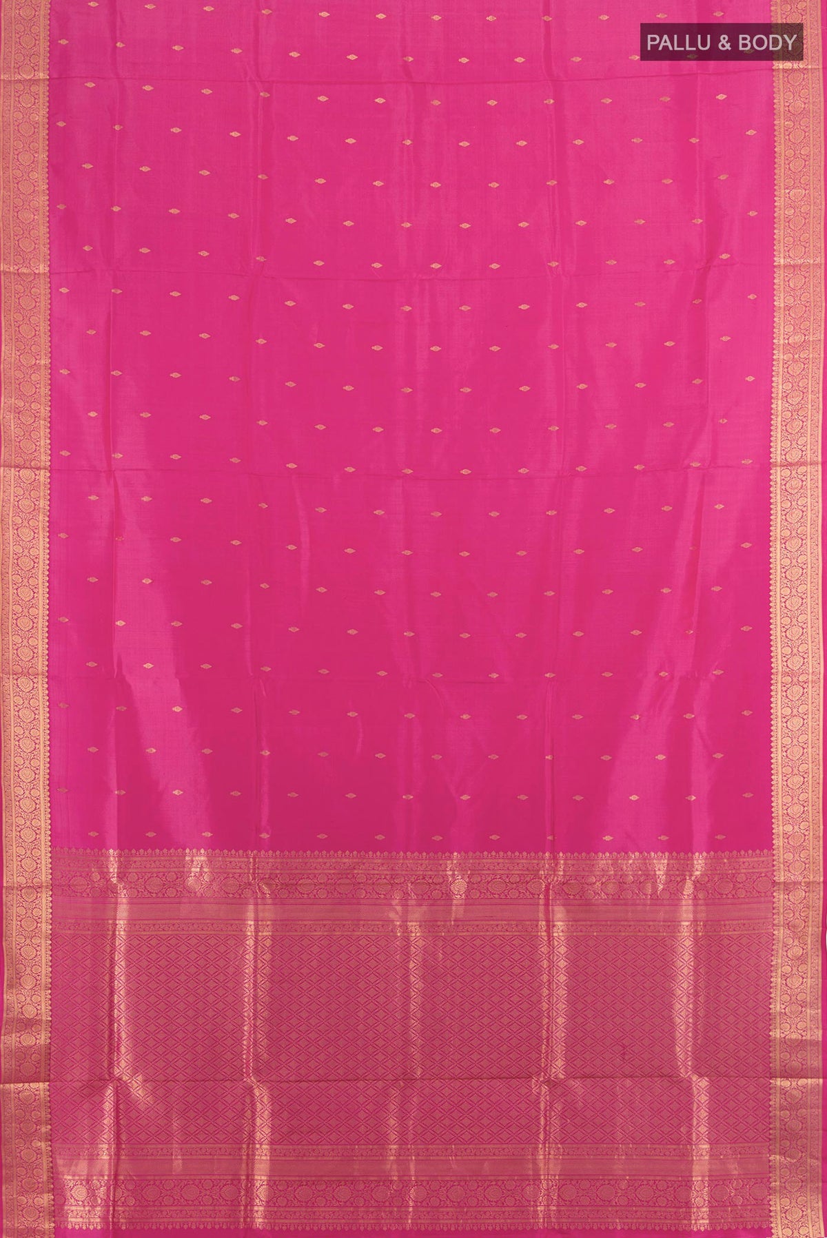 Flat view of Pure Silk Rose pink Soft Saree with Zari Butta on the body and Silk Border. 