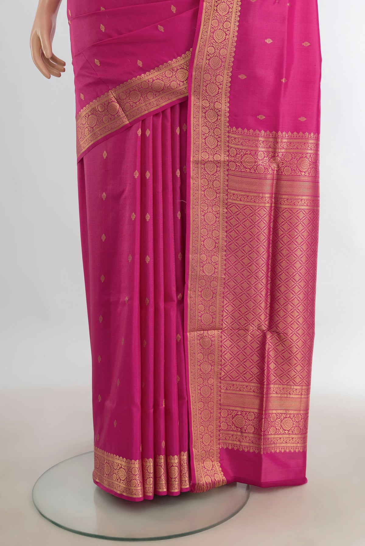 Pleats and pallu of Pure Silk Rose pink Soft Saree with Zari Butta on the body and Silk Border. 