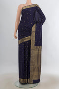 Pure Silk Navy Blue Soft Saree with Zari Butta on the body and Zari Border.  displayed on a mannequin
