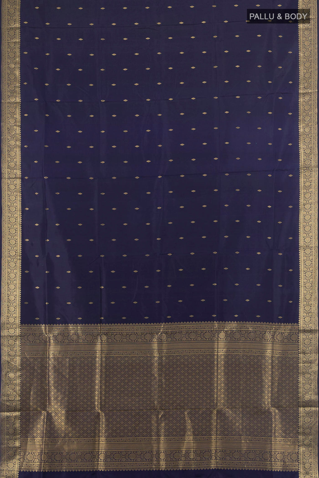 Flat view of Pure Silk Navy Blue Soft Saree with Zari Butta on the body and Zari Border. 