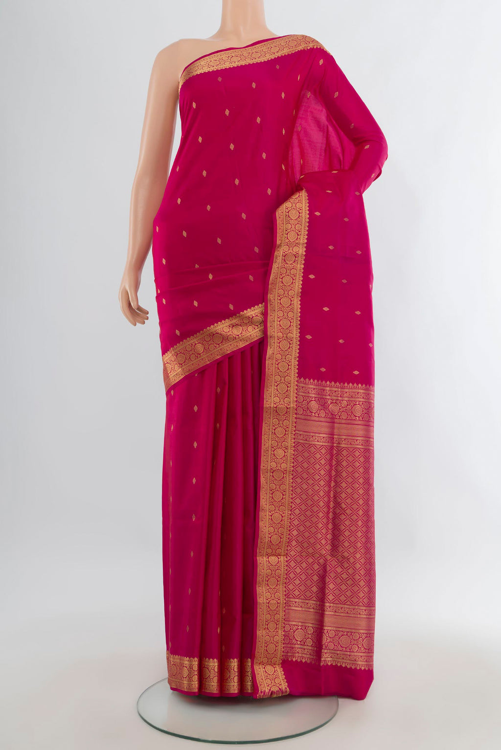 Pure Silk Dark Pink Soft Saree with Zari Butta on the body and Zari Border.  displayed on a mannequin