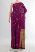 Pure Silk Magenta Kanchipuram Saree with Zari Butta on the body and Plain Border.  displayed on a mannequin