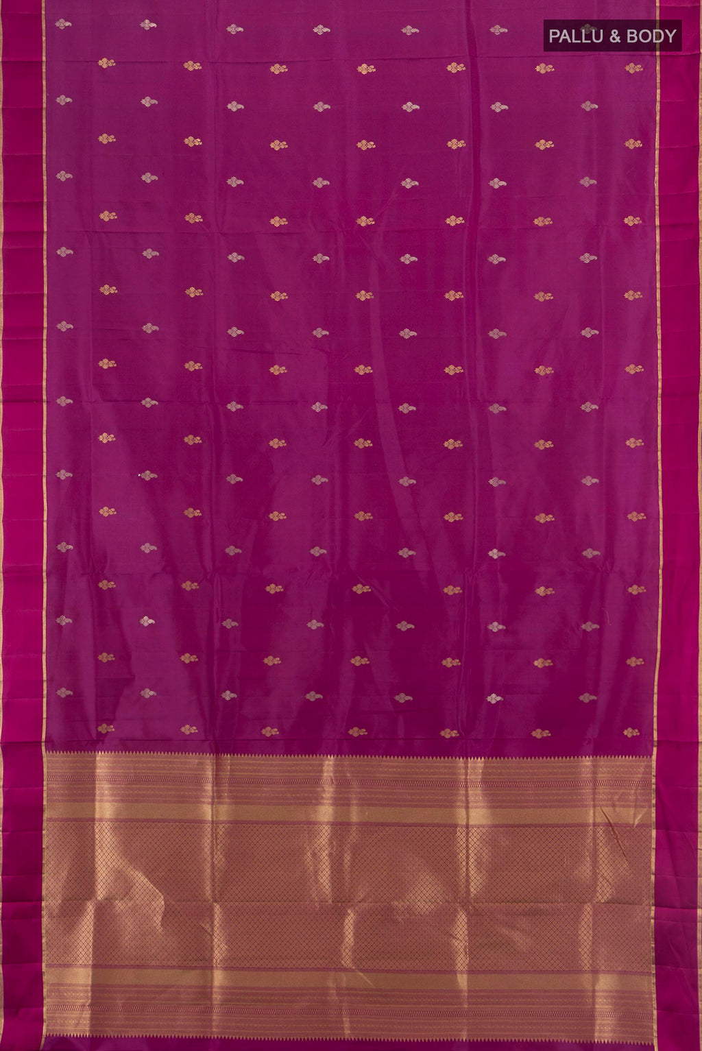Flat view of Pure Silk Magenta Kanchipuram Saree with Zari Butta on the body and Plain Border. 