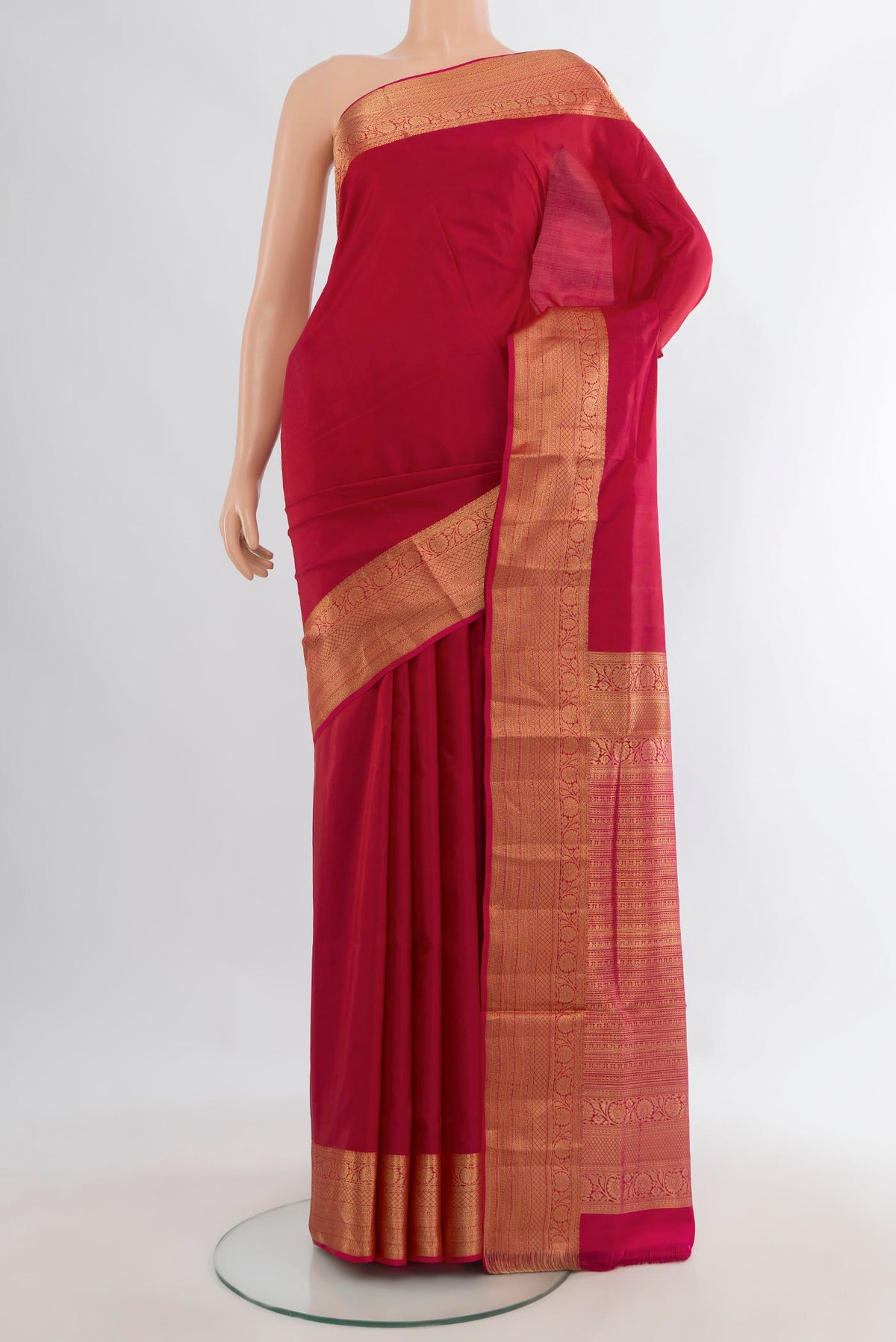 Pure Silk Dark Pink Soft Saree with Plain Body and Zari Border.  displayed on a mannequin