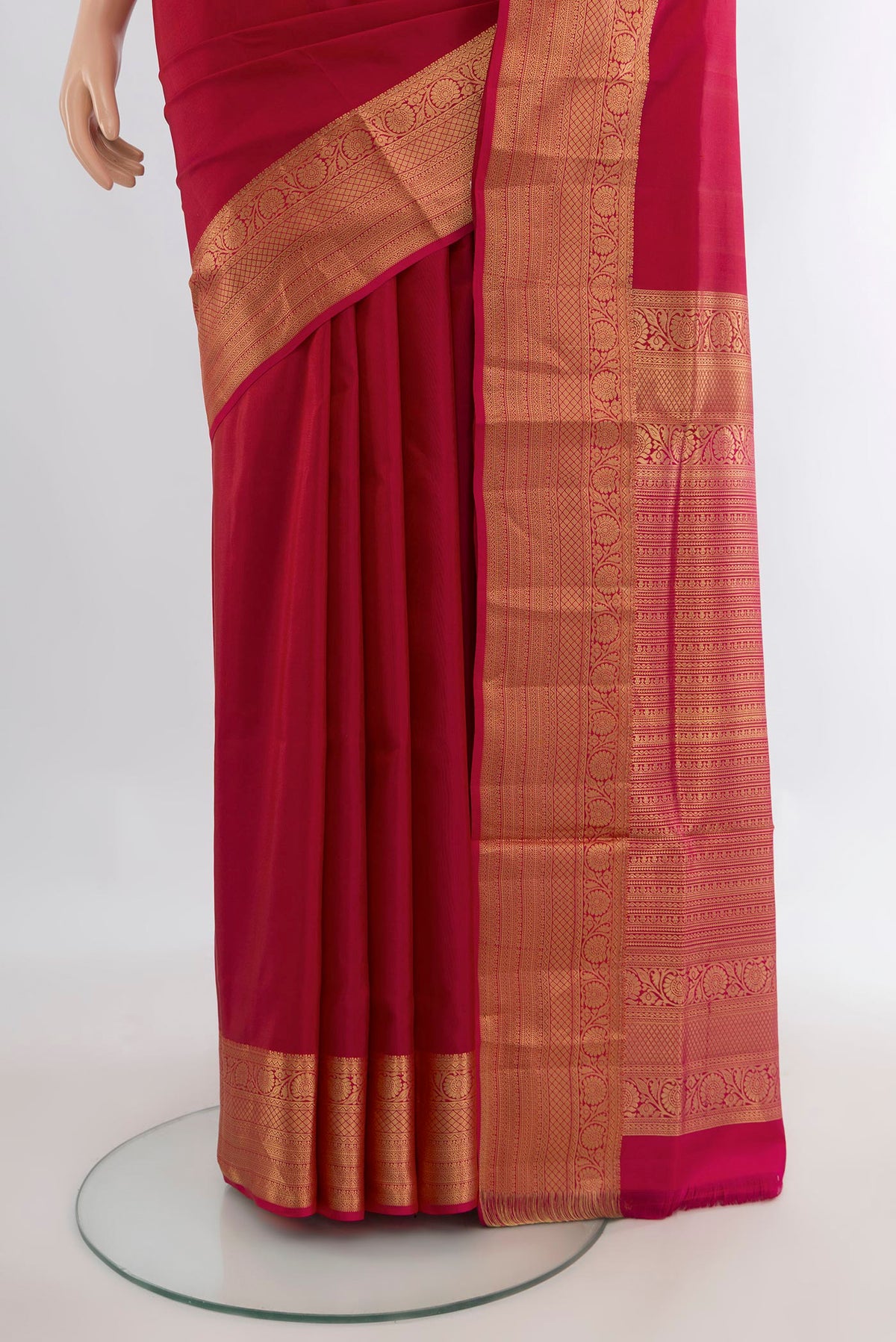 Pleats and pallu of Pure Silk Dark Pink Soft Saree with Plain Body and Zari Border. 