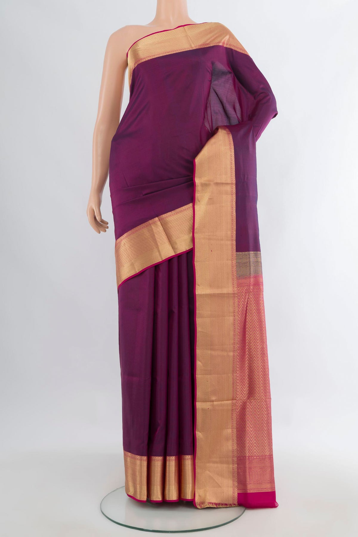 Pure Silk Maroon Soft Saree with Plain Body and Zari Border.  displayed on a mannequin