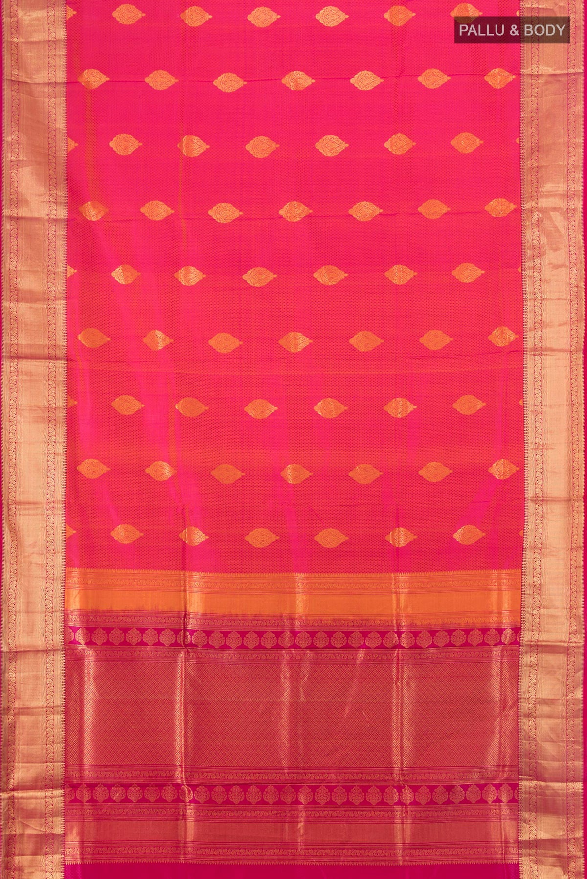 Flat view of Pure Silk Coral Soft Saree with Zari Butta on the body and Zari Border. 