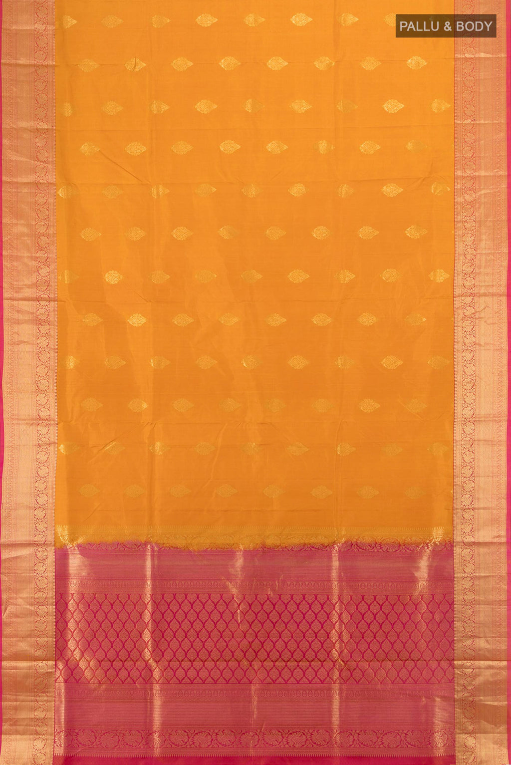 Flat view of Pure Silk Mustard Soft Saree with Zari Butta on the body and Zari Border. 