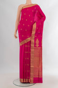 Pure Silk Pink Soft Saree with Zari Butta on the body and Zari Border.  displayed on a mannequin