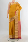 Pure Silk Mustard Soft Saree with Jacquard design on the body and Zari Border.  displayed on a mannequin