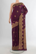 Pure Silk Coffee Brown Soft Saree with Zari Butta on the body and Fancy Border.  displayed on a mannequin