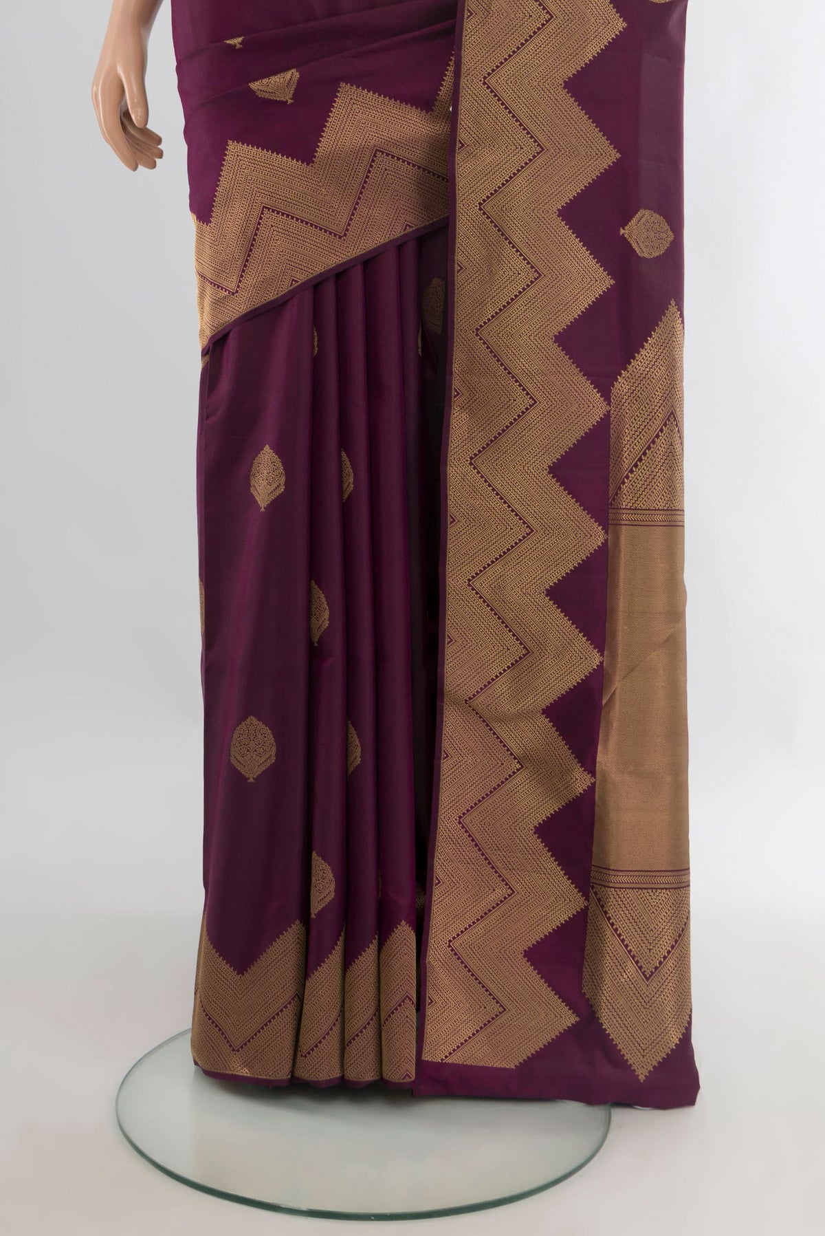 Pleats and pallu of Pure Silk Coffee Brown Soft Saree with Zari Butta on the body and Fancy Border. 