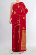 Pure Silk Red Soft Saree with Zari Butta on the body and Plain Border.  displayed on a mannequin