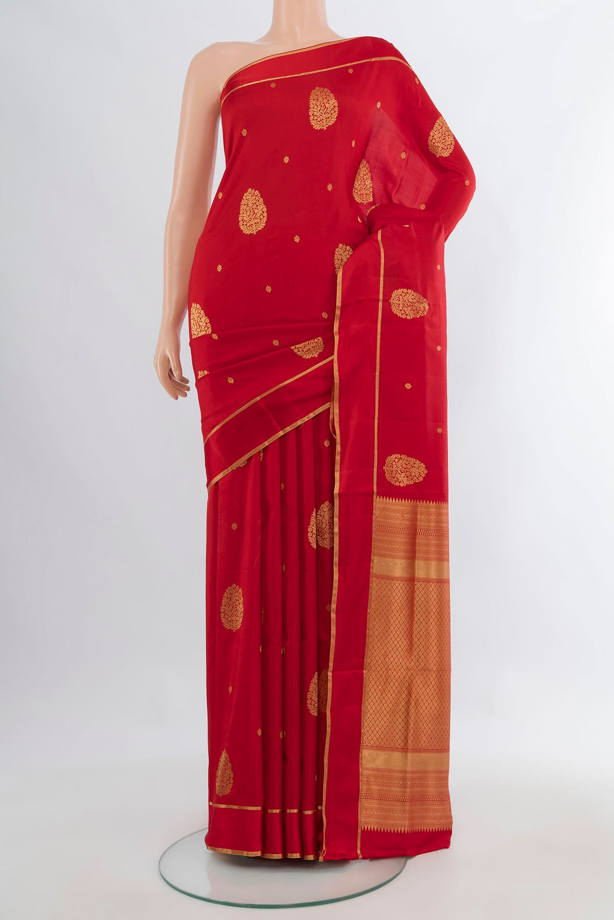 Pure Silk Red Soft Saree with Zari Butta on the body and Plain Border.  displayed on a mannequin