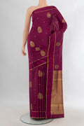 Pure Silk Maroon Soft Saree with Zari Butta on the body and Plain Border.  displayed on a mannequin