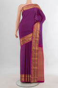 Pure Silk Purple Kanchipuram Saree with Checked design on the body and Zari Border.  displayed on a mannequin