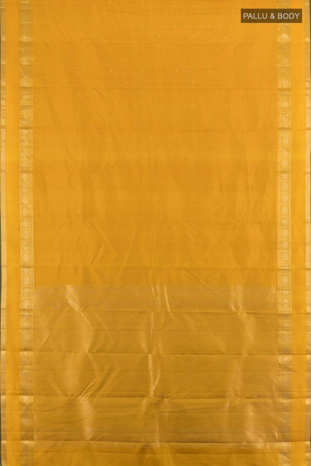 Flat view of Pure Silk Mustard Kanjivaram Saree with Zari Butta on the body and Zari Border. 