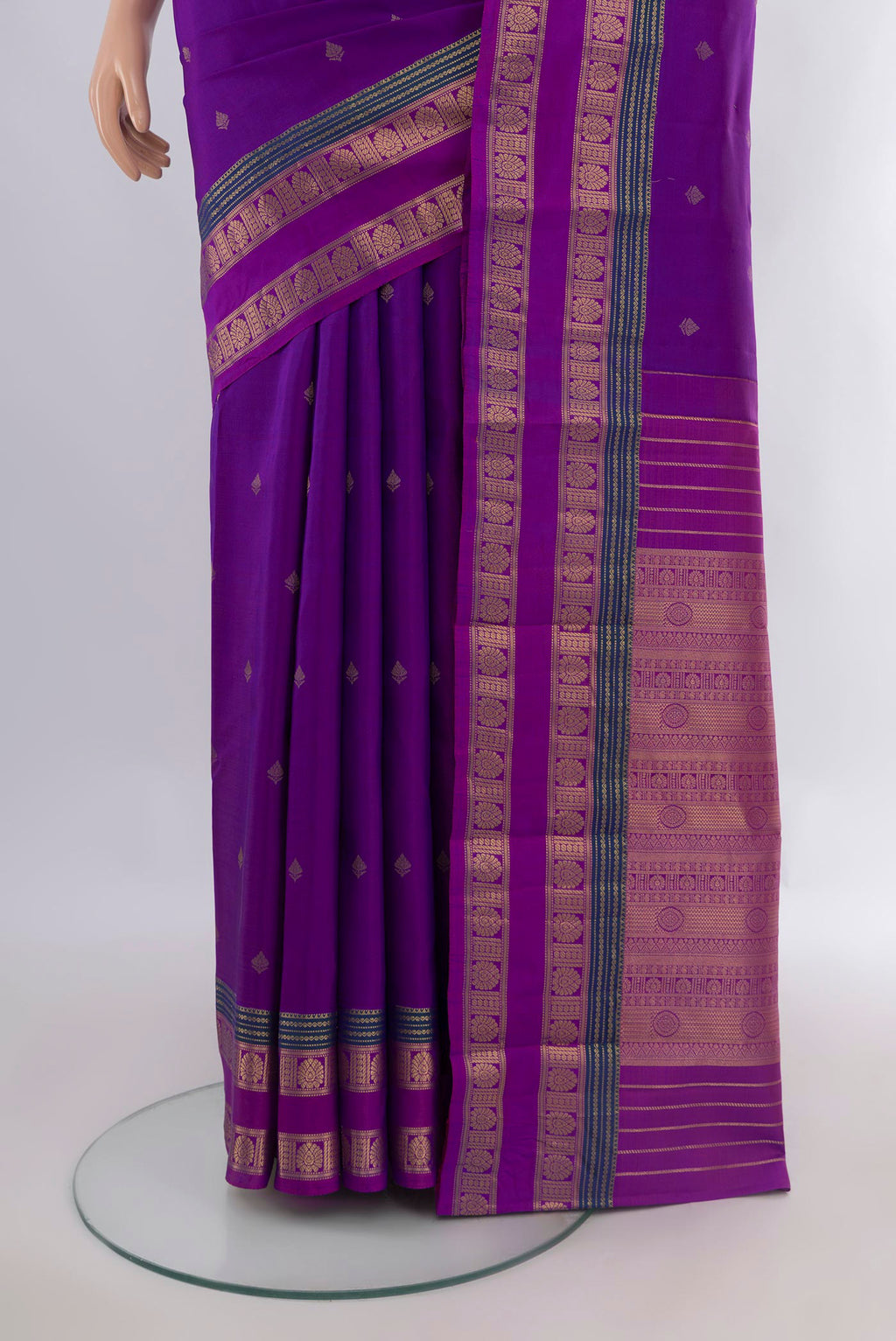 Pleats and pallu of Pure Silk Purple Kanchipuram Saree with Zari Butta on the body and Zari Border. 