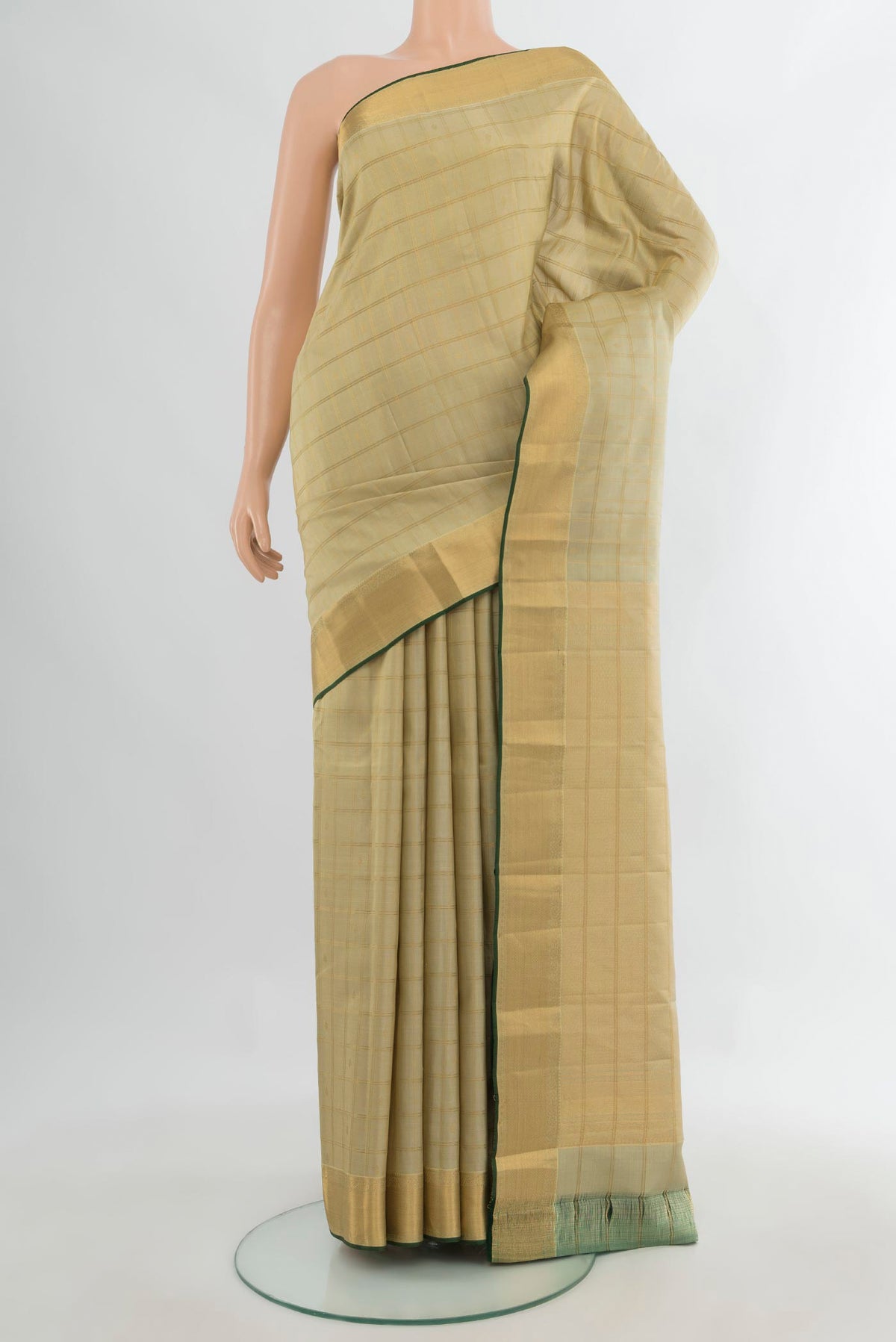 Pure Silk Sandal Kanchipuram Saree with Stripes on the body and Zari Border.  displayed on a mannequin