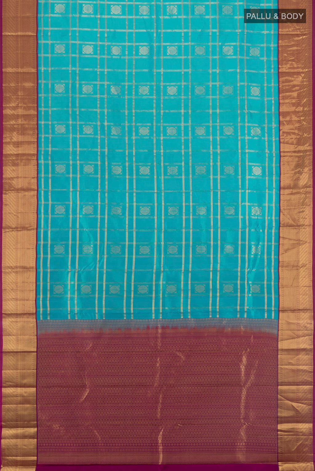 Flat view of Pure Silk Turquoise Kanchipuram Saree with Checked design on the body and Zari Border. 