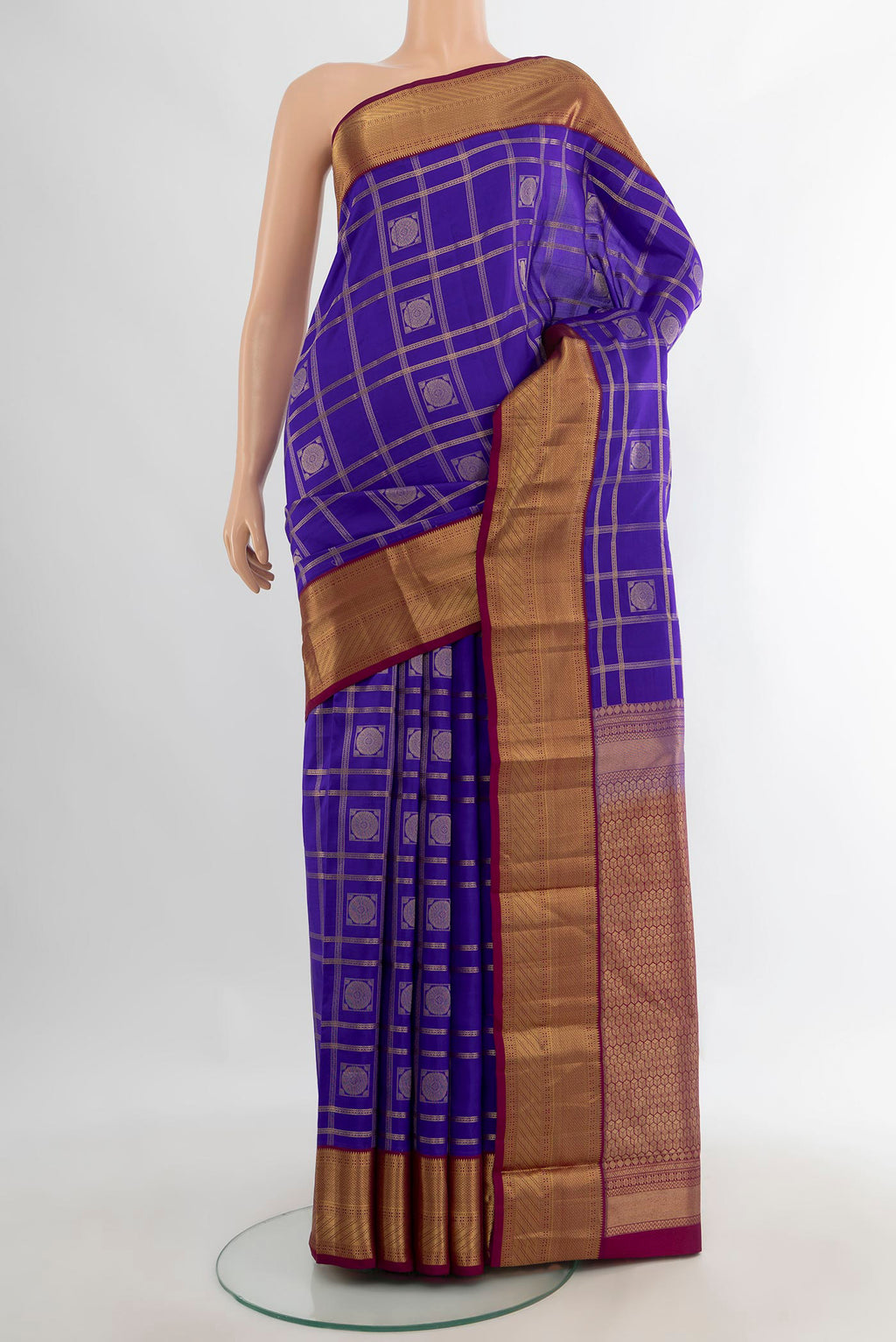 Pure Silk Dark Blue Kanchipuram Saree with Checked design on the body and Zari Border.  displayed on a mannequin