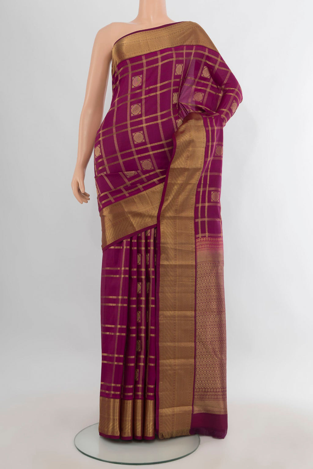 Pure Silk Maroon Kanchipuram Saree with Checked design on the body and Zari Border.  displayed on a mannequin