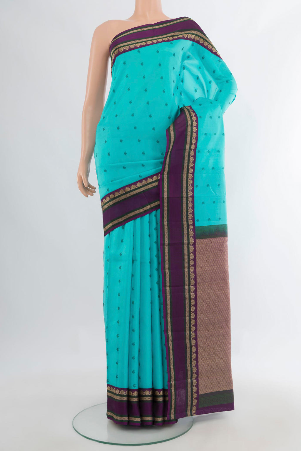 Pure Silk Light Blue Kanjivaram Saree with Thread Butta on the body and Plain Border.  displayed on a mannequin