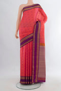 Pure Silk Coral Kanjivaram Saree with Thread Butta on the body and Thread Border.  displayed on a mannequin