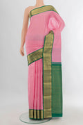 Pure Silk Rose pink Kanjivaram Saree with Zari Butta on the body and Zari Border.  displayed on a mannequin