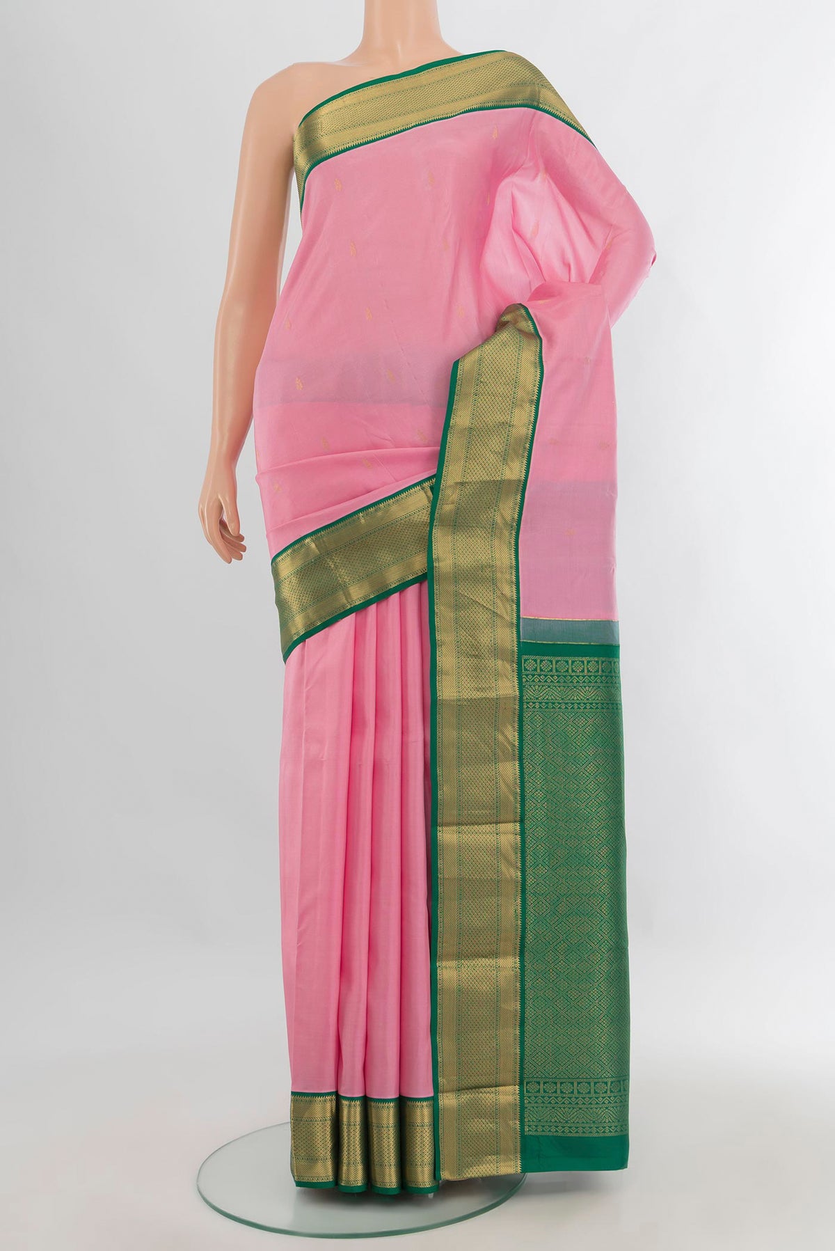 Pure Silk Rose pink Kanjivaram Saree with Zari Butta on the body and Zari Border.  displayed on a mannequin